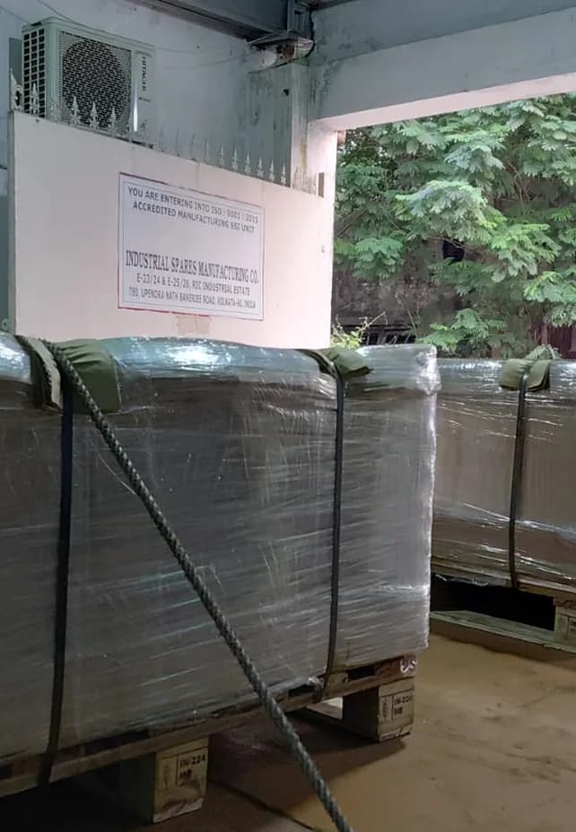Finished goods shrink-wrapped and palletized for export at the loading bay