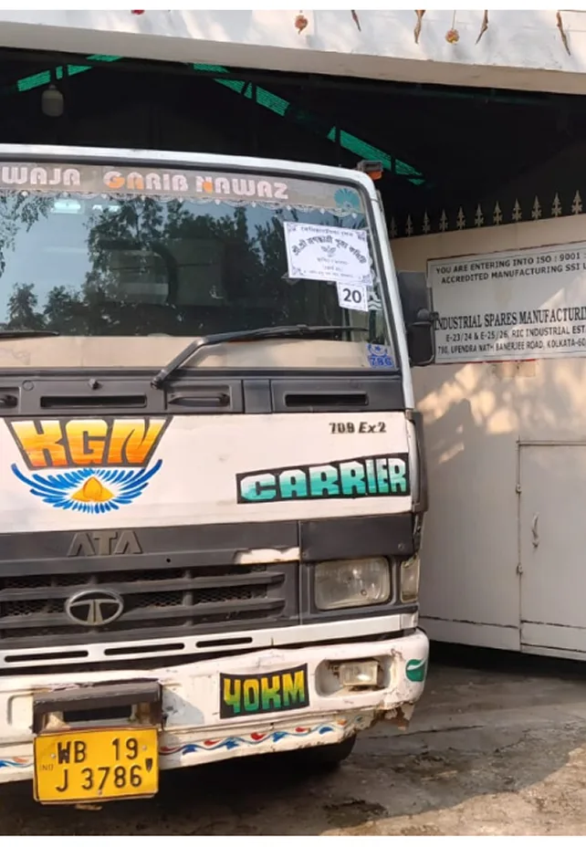 Delivery truck at the Industrial Spares Manufacturing Co. facility gate
